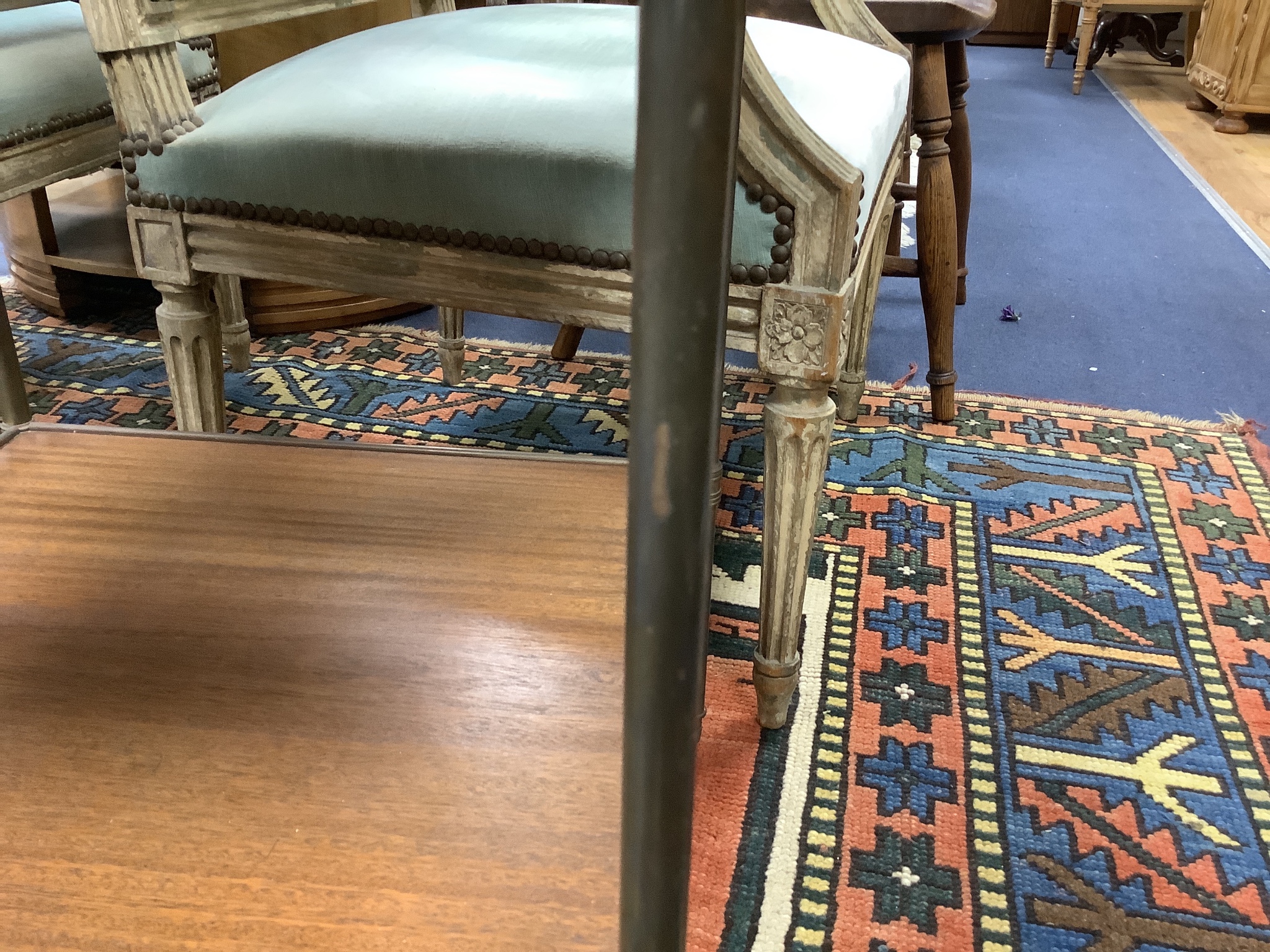 A pair of brass and teak two tier occasional tables, width 44cm depth 44cm height 58cm